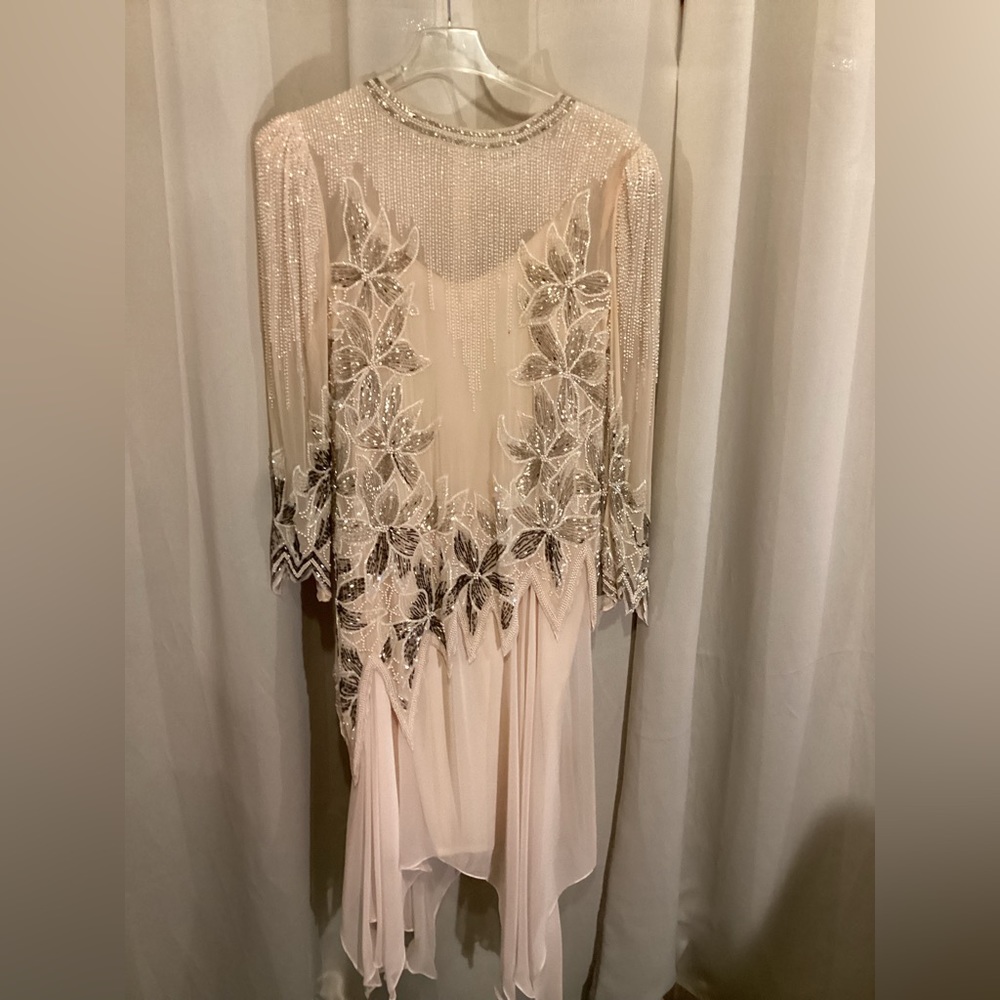 Light peach beaded dress, fully lined slipstyle, skirt with handkerchief hemline